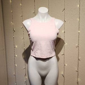 Lululemon baby pink top, built in bra, pads are removable  size 10 like new